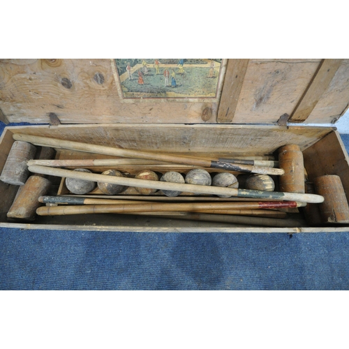 1272 - A VINTAGE FRENCH CROQUET SET, in a pine case, the inner lid reading 'Jeu De Croquet' (condition:- in... 