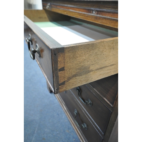 1280 - A GEORGIAN MAHOGANY BACHELORS CHEST, with a brushing slide above four graduated drawers on bracket f... 