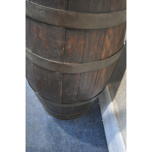 1285 - A 19TH CENTURY COOPERED OAK BARREL  66cm X 35cm (condition:-rickety due to age)