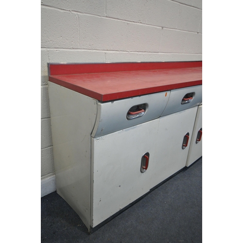 1289 - A 1950'S ENGLISH ROSE ENAMEL KITCHEN WORKTOP CABINET, with a red Formica work surface, four frieze d... 