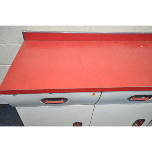 1289 - A 1950'S ENGLISH ROSE ENAMEL KITCHEN WORKTOP CABINET, with a red Formica work surface, four frieze d... 