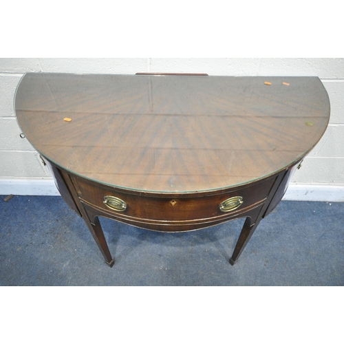 1290 - A GEORGIAN MAHOGANY DEMI LUNE SIDE TABLE, with a single drawer, flanked by cupboard doors, on square... 