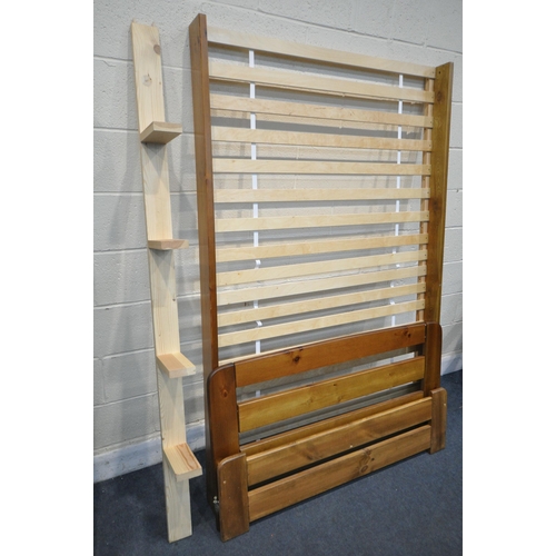 1304 - A MODERN PINE 4FT BEDSTEAD, with side rails slats and bolts, along with an Emma memory foam mattress... 