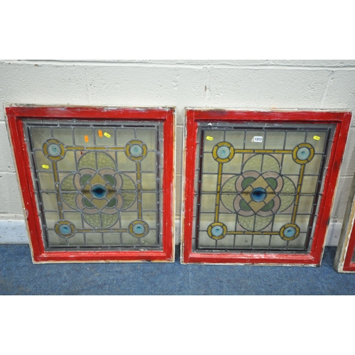 1313 - A PAIR OF ARTS AND CRAFTS COLOURED LEAD GLAZED WINDOWS, within a wooden frame, frame measurements 64... 