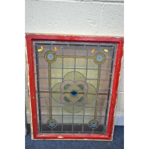 1313 - A PAIR OF ARTS AND CRAFTS COLOURED LEAD GLAZED WINDOWS, within a wooden frame, frame measurements 64... 