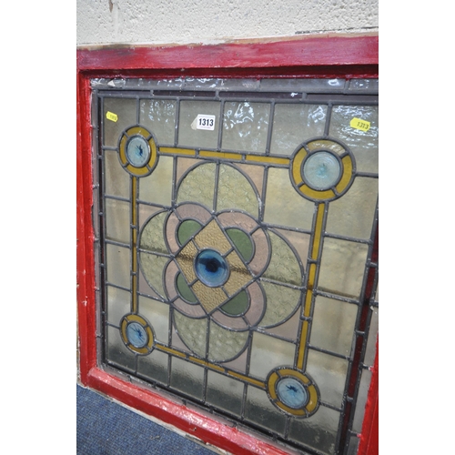 1313 - A PAIR OF ARTS AND CRAFTS COLOURED LEAD GLAZED WINDOWS, within a wooden frame, frame measurements 64... 