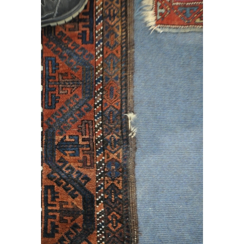 1319 - THREE ANTIQUE EASTERN PERSIAN WOOLLEN RUGS, of various patterns and colours, largest rug measurement... 