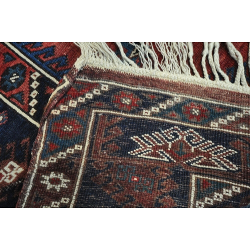 1320 - TWO SIMILAR PERSIAN KAZAK RUGS, made up of red and blue fields largest rug measurement  214cm x 125c... 