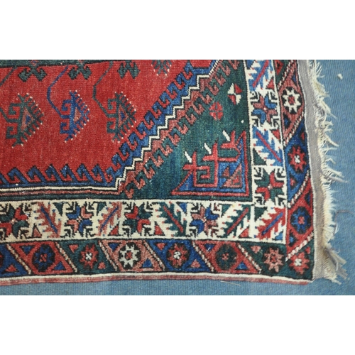 1320 - TWO SIMILAR PERSIAN KAZAK RUGS, made up of red and blue fields largest rug measurement  214cm x 125c... 