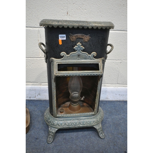 1331 - A VINTAGE PETROLUX METAL AND ENAMELLED CONSERVATORY PARAFIN HEATER, along with a square copper kettl... 