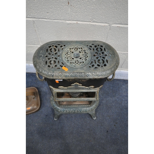 1331 - A VINTAGE PETROLUX METAL AND ENAMELLED CONSERVATORY PARAFIN HEATER, along with a square copper kettl... 