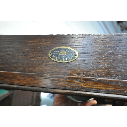 1335 - AN EARLY 20TH CENTURY MAPLE AND CO OF LONDON, OAK TWO DOOR HALL ROBE/CUPBOARD, enclosing a shelf fit... 