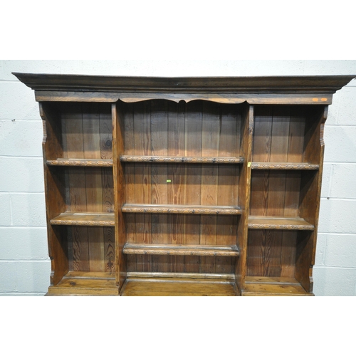 1339 - 20TH CENTURY OAK DRESSER, top with an arrangement of shelving, over a base of three drawers and two ... 