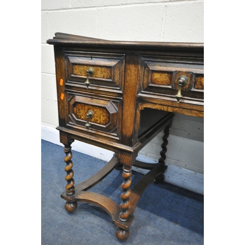 1340 - AN EARLY 20TH CENTURY OAK PEDASTAL SIDEBOARD, with a gallery top over five drawers with brass drop h... 