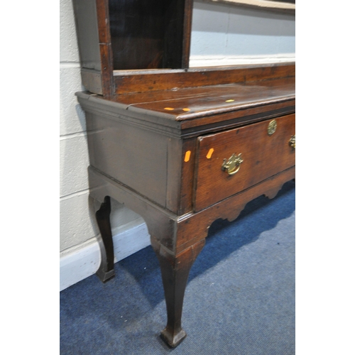 1350 - A GEORGIAN OAK DRESSER, a plate rack with an arrangement of shelving over a base with three deep dra... 