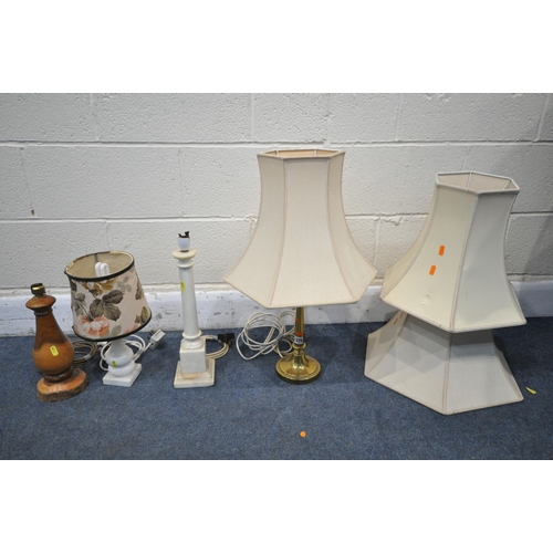 1375 - FOUR VARIOUS TABLE LAMPS, to include an Arts and Craft brass lamp, two marble lamps and a rustic liv... 