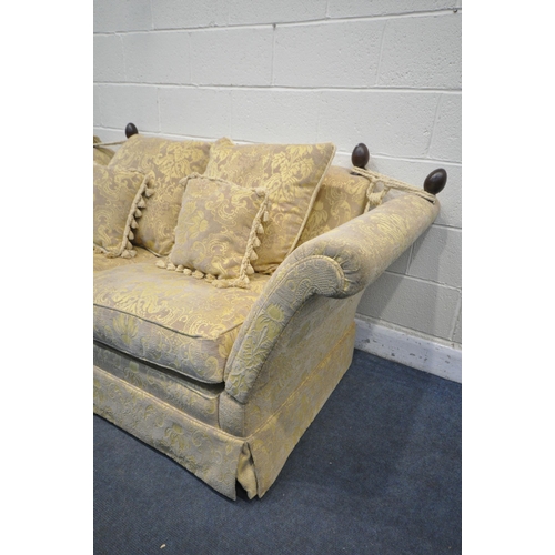 1386 - A KNOWLE GOLD UPHOLSTERED SOFA, with scatter cushions, length 196cm x depth 94cm x 76cm