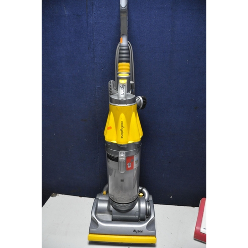 1053 - A DYSON DC07 UPRIGHT VACUUM (PAT pass and working), along with a Hoover JC3165 upright vacuum (PAT f... 