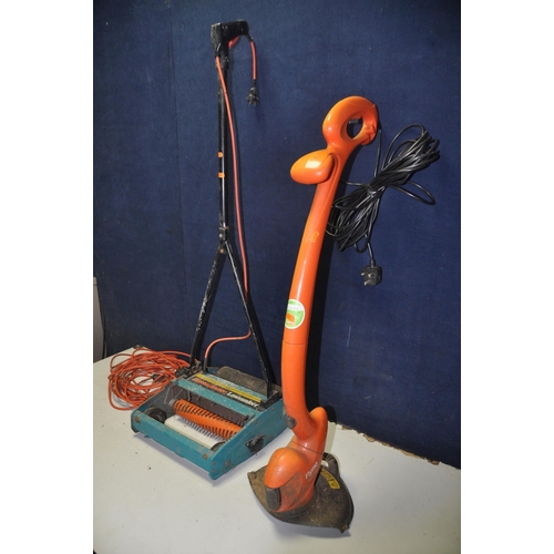 1085 - A FLYMO PWT23 STRIMMER along with a Black and Decker S3E16 lawn Raker (both UNTESTED) (2)