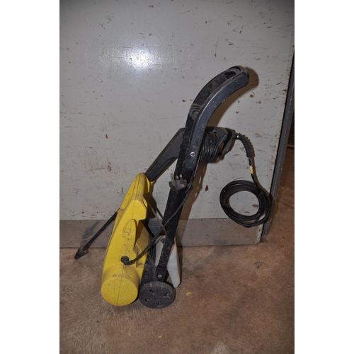 1087 - A KARCHER K2.87 PRESSURE WASHER with lance and hose (PAT pass and powers up)