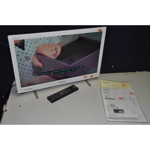 1094 - A SONY KDL-24EX320 24in TV with remote and instruction manuals (PAT pass and working)