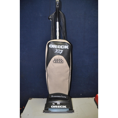 1102 - A ORECK XL7-705ECBPK UPRIGHT VACUUM (PAT pass and working)