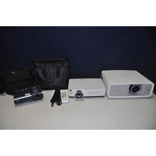 1110 - A SANYO PLV-2700 PROJECTOR with no power cable, Sanyo PLC-WXU300 with no power cable and a Benq PB-2... 