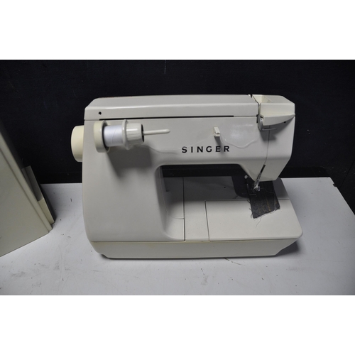 1127 - A SINGER FUTURA 2001 SEWING MACHINE with case and foot pedal (PAT pass and working)