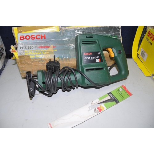 1136 - A BOSCH POF500-A ROUTER in original box with attachments, along with a Bosch PFZ-550E all-purpose sa... 