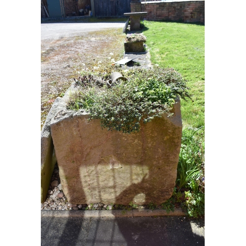 955 - A VERY LARGE AND VERY HEAVY VINTAGE SANDSTONE TROUGH width 86cm depth 85cm height 74cm wall thicknes... 