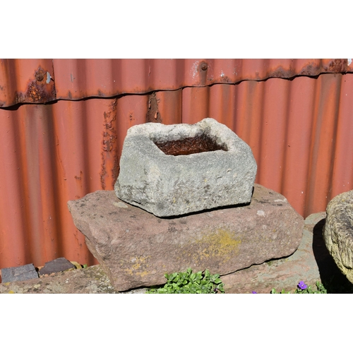 983 - VARIOUS GARDEN ORNAMENTS including two sandstone blocks, a sandstone water feeder, a composite birdb... 