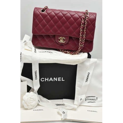 1 - A CHANEL CLASSIC MEDIUM DOUBLE FLAP HANDBAG, with signature diamond quilted lambskin leather exterio... 