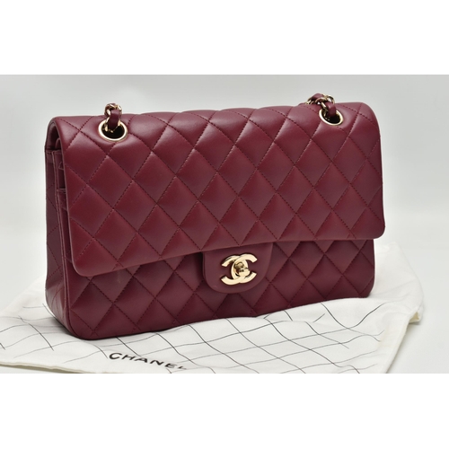 1 - A CHANEL CLASSIC MEDIUM DOUBLE FLAP HANDBAG, with signature diamond quilted lambskin leather exterio... 