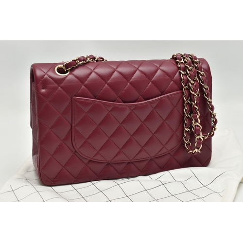 1 - A CHANEL CLASSIC MEDIUM DOUBLE FLAP HANDBAG, with signature diamond quilted lambskin leather exterio... 