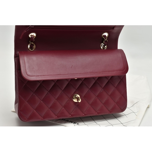 1 - A CHANEL CLASSIC MEDIUM DOUBLE FLAP HANDBAG, with signature diamond quilted lambskin leather exterio... 