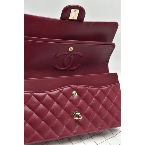 1 - A CHANEL CLASSIC MEDIUM DOUBLE FLAP HANDBAG, with signature diamond quilted lambskin leather exterio... 