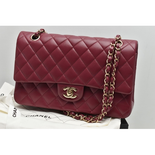 1 - A CHANEL CLASSIC MEDIUM DOUBLE FLAP HANDBAG, with signature diamond quilted lambskin leather exterio... 