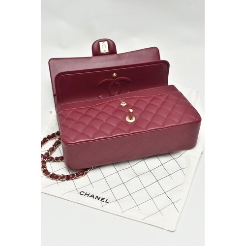 1 - A CHANEL CLASSIC MEDIUM DOUBLE FLAP HANDBAG, with signature diamond quilted lambskin leather exterio... 