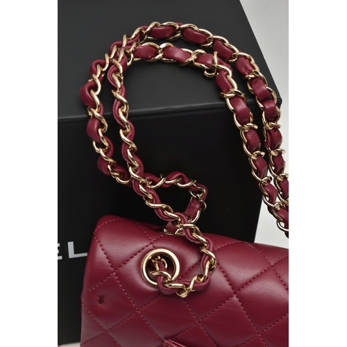 1 - A CHANEL CLASSIC MEDIUM DOUBLE FLAP HANDBAG, with signature diamond quilted lambskin leather exterio... 