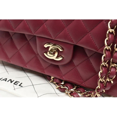 1 - A CHANEL CLASSIC MEDIUM DOUBLE FLAP HANDBAG, with signature diamond quilted lambskin leather exterio... 