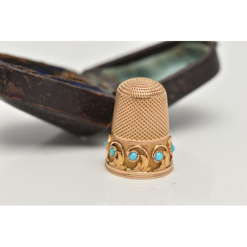 107 - A YELLOW METAL THIMBLE, foliage pattern round the rim set with turquoise cabochons, unmarked, approx... 