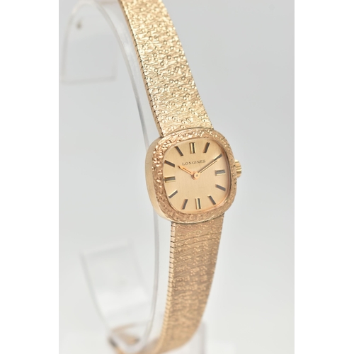 117 - A LADYS 9CT GOLD 'LONGINES' WRISTWATCH, manual wind, rounded square gold dial signed 'Longines', bla... 