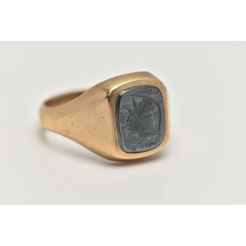 12 - A 9CT GOLD AND HEMATITE GENTS SIGNET RING, yellow gold rectangular signet, inlay set with a hematite... 