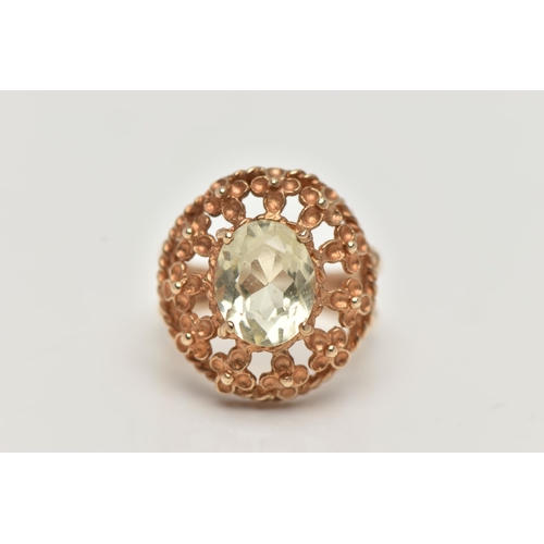 122 - A 9CT GOLD GEM SET RING, set with an oval cut pale green stone assessed as spinel, in a four claw se... 