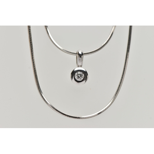 184 - A DIAMOND PENDANT NECKLACE, the polished white metal pendant collet set with a round brilliant cut d... 