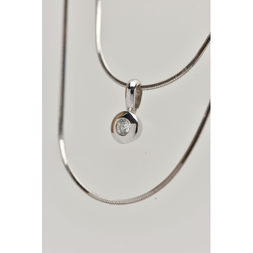 184 - A DIAMOND PENDANT NECKLACE, the polished white metal pendant collet set with a round brilliant cut d... 