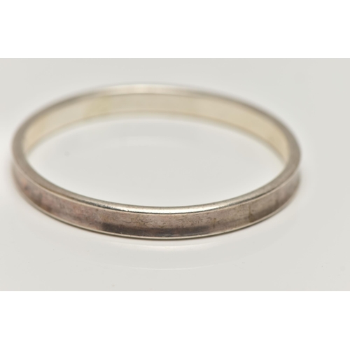 186 - A 'TIFFANY & CO' BANGLE, concaved bangle stamped '925 T&Co 1837', signed to the interior of the band... 