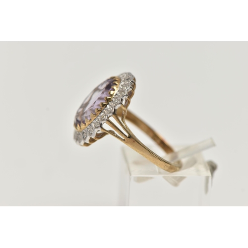 2 - A 9CT GOLD AMETHYST AND DIAMOND DRESS RING, a principal set oval cut amethyst with halo surround of ... 