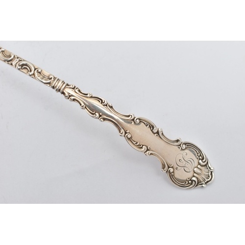 201 - AN AMERICAN STERLING SILVER LADLE, the handle cast with scroll and shell decoration and engraved mon... 