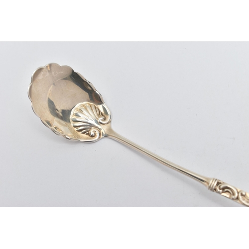 201 - AN AMERICAN STERLING SILVER LADLE, the handle cast with scroll and shell decoration and engraved mon... 